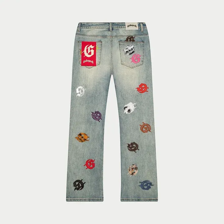 94 Godspeed Allover Logo Embroidered Light Wash Denim Jeans - Image 1